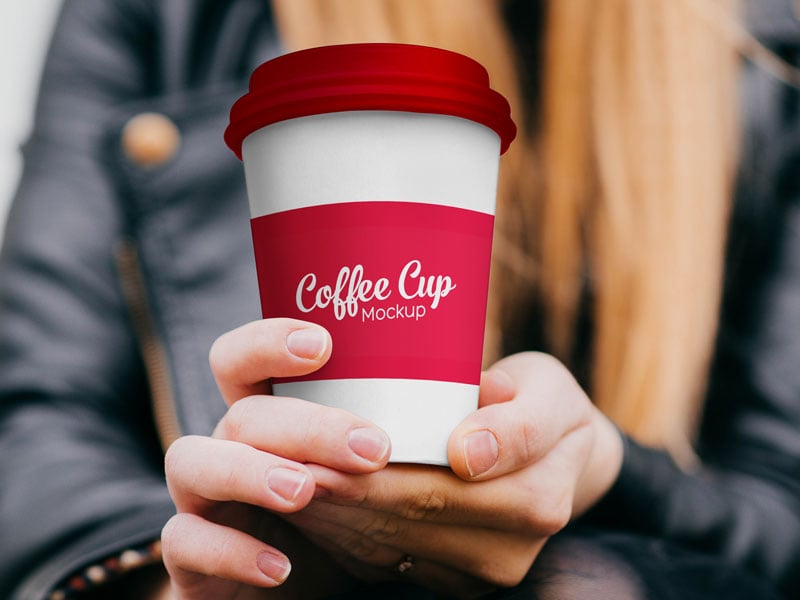 Download Free Paper Coffee Cup In Hand Mockup Psd