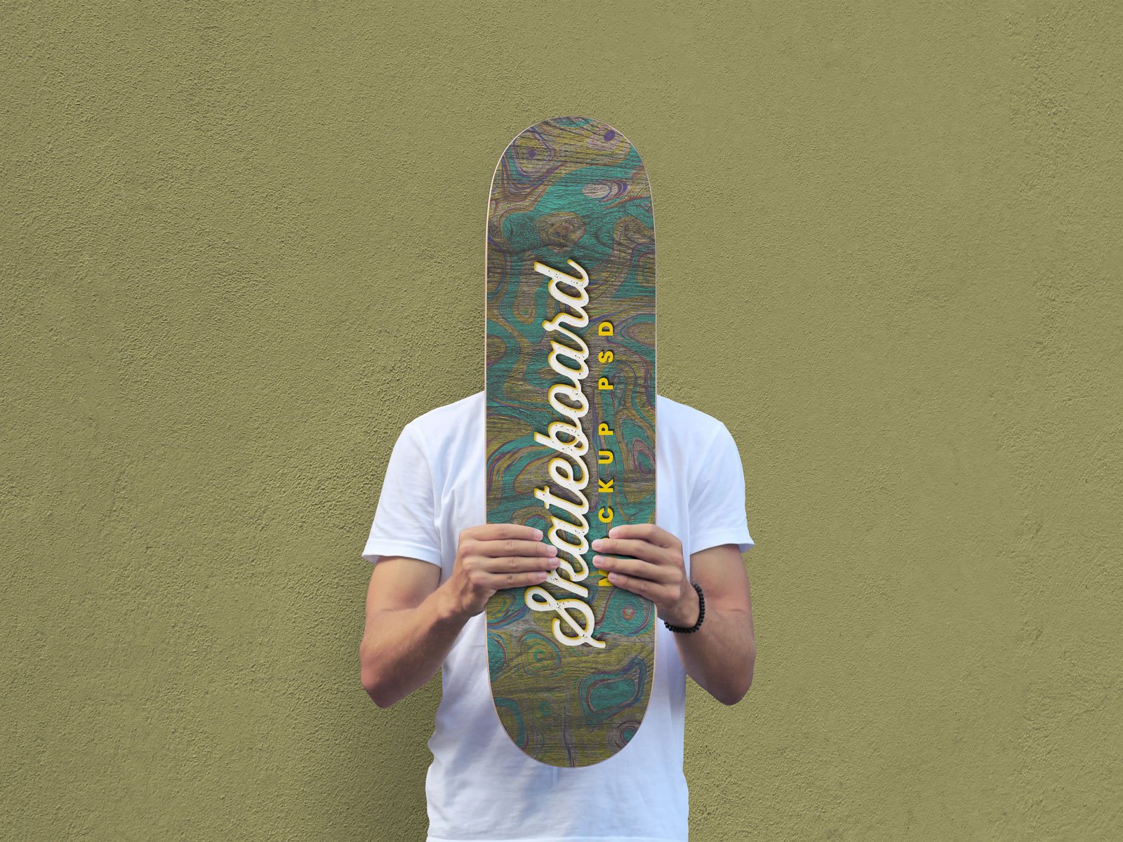Download Free Man Holding Skateboard Mockup PSD | Designbolts
