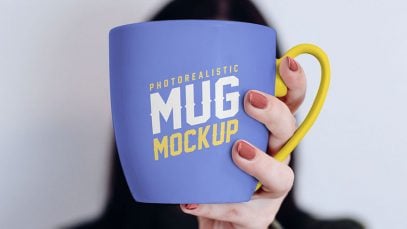 Free-Mug-in-Female-Hand-Mockup-PSD-4