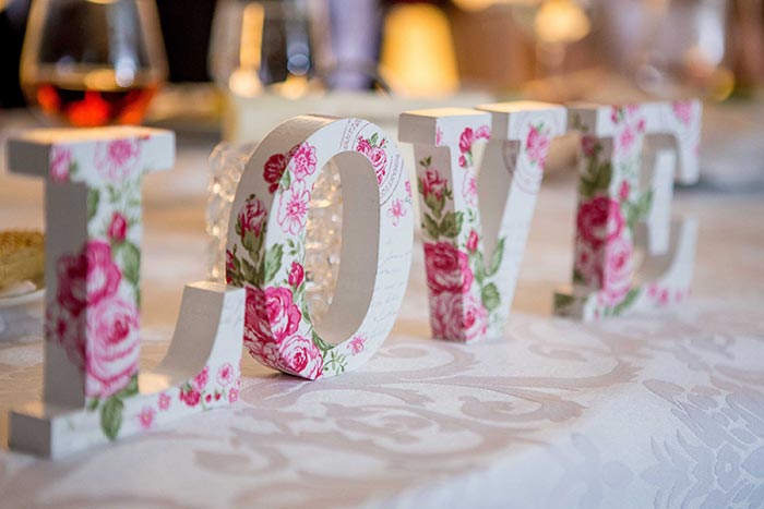 white-and-pink-floral-freestanding-letter-wallpape