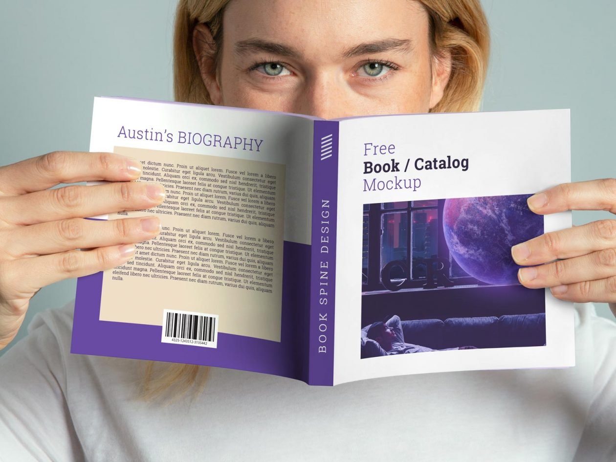 Free Hand Holding Paperback Square Book Mockup PSD