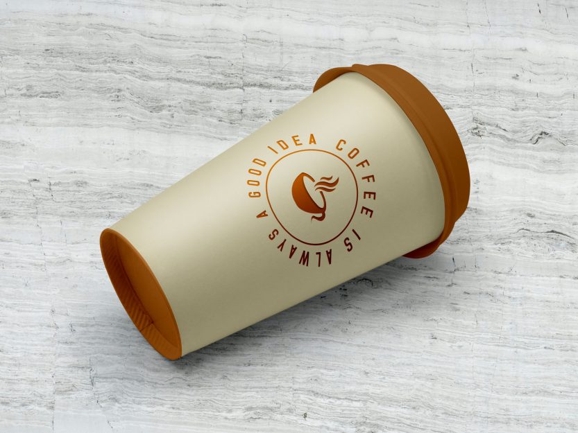 Download Free Paper Coffee Cup Lying on Floor Mockup PSD | Designbolts