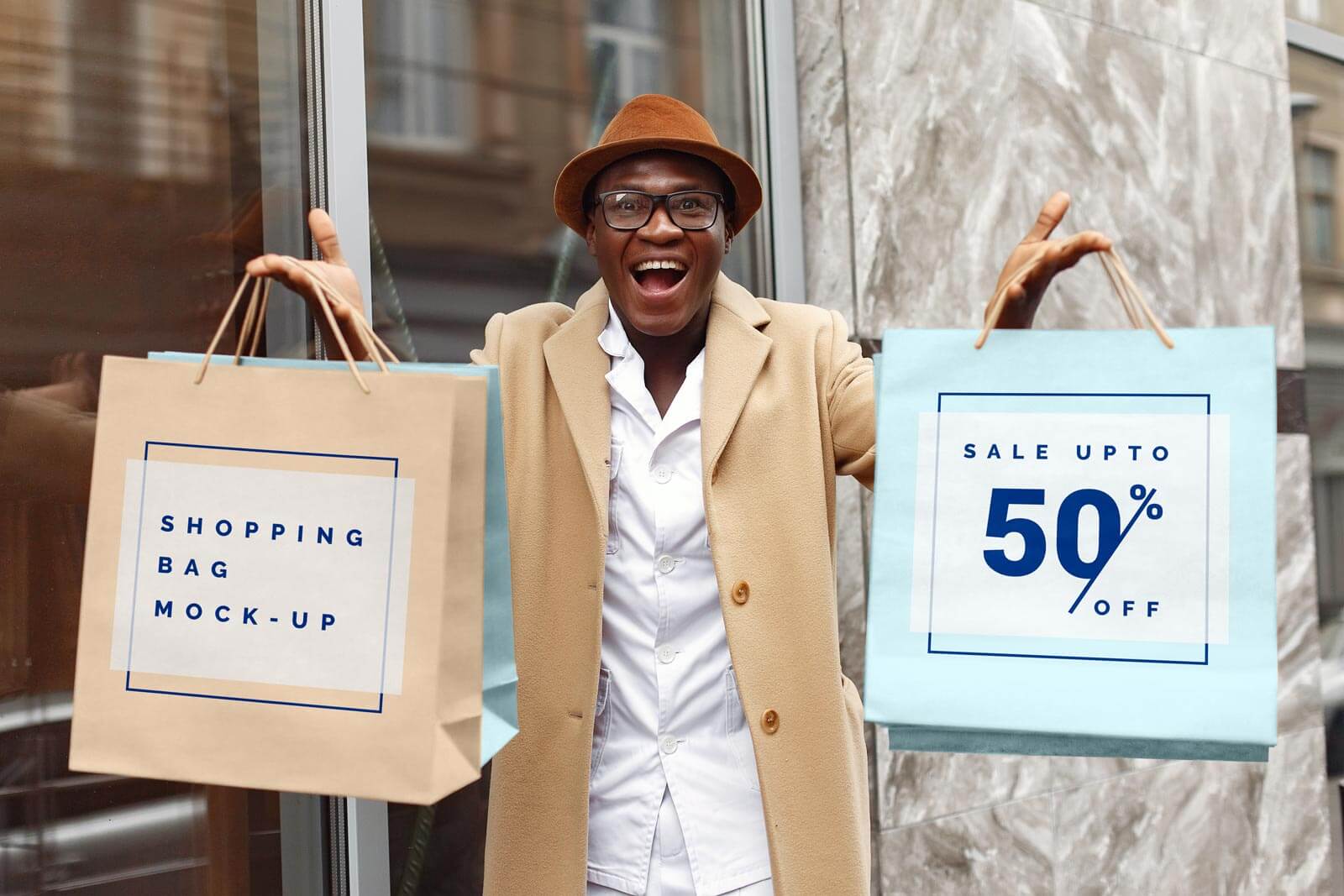 Download Free Excited Man Hand Holding Shopping Bags Mockup PSD ...