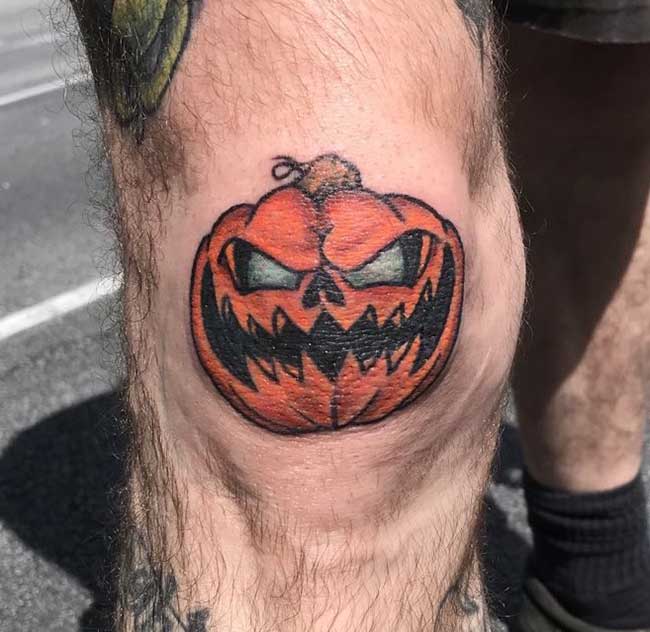 20 Awesome Halloween Inspired Tattoos  iHorror  Pumpkin tattoo Evil  pumpkin Halloween tattoos