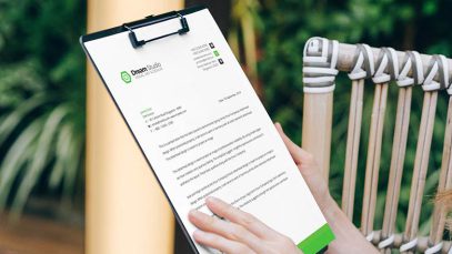 Free-Hand-Holding-Clipboard-Mockup-PSD