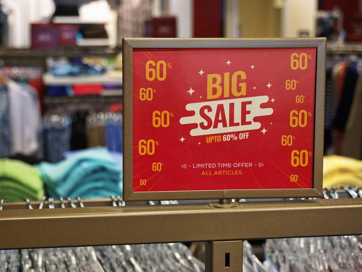 Free Clothing Rack Sale Signage Mockup PSD Designbolts